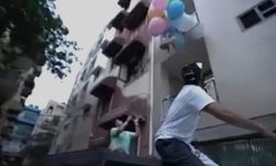 Hindistan'da bir YouTuber, köpeğini helyum balonlarıyla uçurdu!