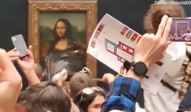 Mona Lisa'ya pastalı saldırı! Yaşlı kadın kılığına girdi... - VİDEO